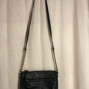 Black Crossbody Bag with Quilted Texture and Silver Chain Detail